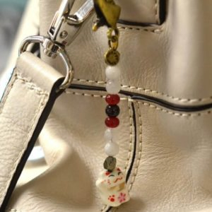 prosperity-purse-maneki-neko Schmuckstücke mit besonders positiver Wirkung für die Handtasche